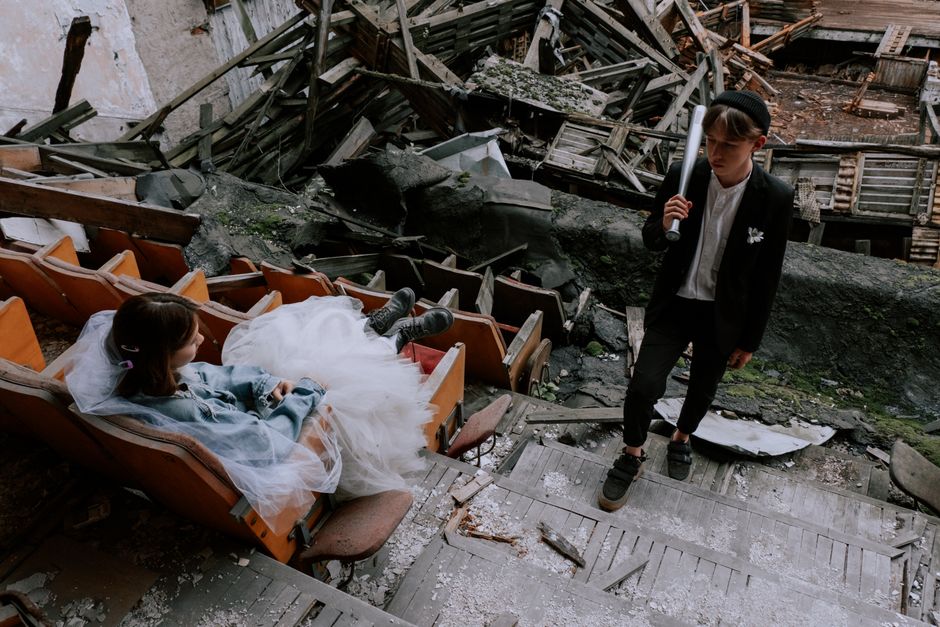 Cinematic wedding couple standing together in beautiful lighting